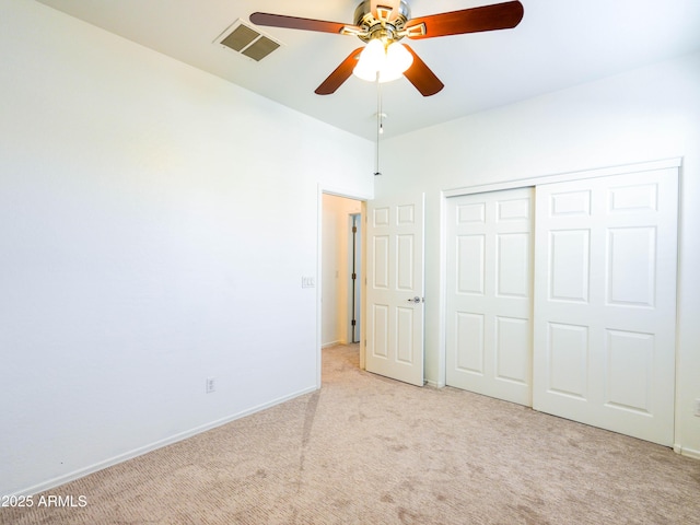 19403 E Arrowhead Trl, Queen Creek, AZ 85142 - unfurnished bedroom featuring carpet, a closet, baseboards, and a ceiling fan