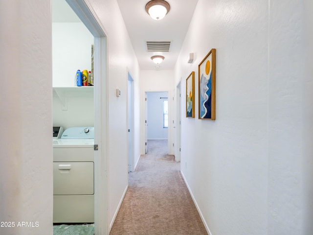 19403 E Arrowhead Trl, Queen Creek, AZ 85142 - hallway with light colored carpet and washer and clothes dryer