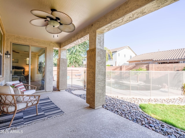 19403 E Arrowhead Trl, Queen Creek, AZ 85142 - fenced backyard with ceiling fan and a patio area
