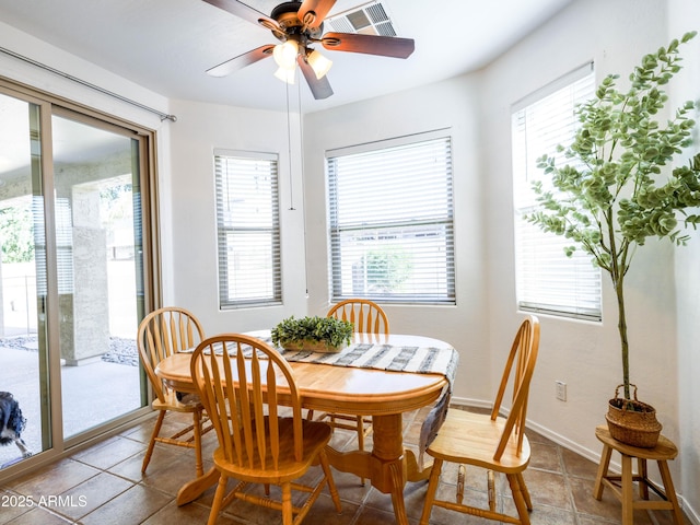 19403 E Arrowhead Trl, Queen Creek, AZ 85142 - dining room with plenty of natural light, a ceiling fan, and tile patterned floors