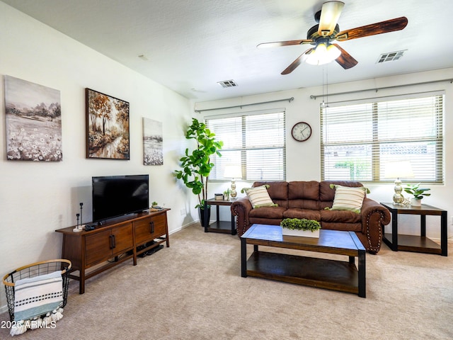 19403 E Arrowhead Trl, Queen Creek, AZ 85142 - living area featuring a ceiling fan, light colored carpet, and baseboards