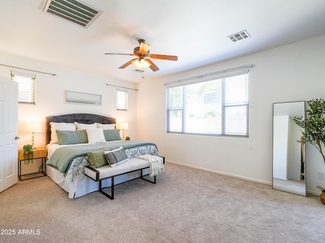 19403 E Arrowhead Trl, Queen Creek, AZ 85142 - carpeted bedroom with multiple windows, baseboards, and ceiling fan