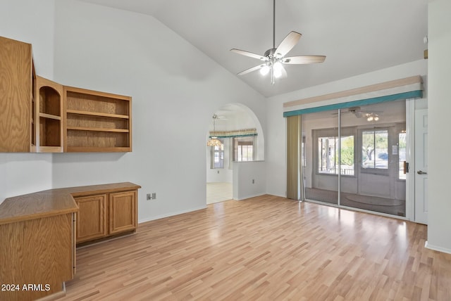 foyer with ceiling fan, light hardwood / wood-style flooring, and high vaulted ceiling