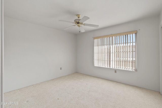 unfurnished room featuring ceiling fan