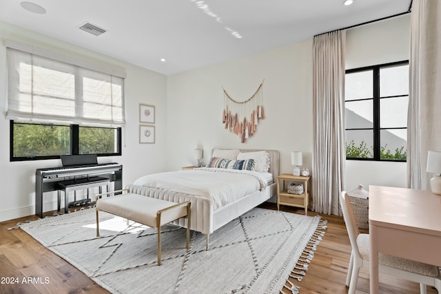 bedroom with light wood-type flooring