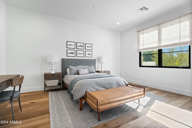 bedroom featuring hardwood / wood-style floors