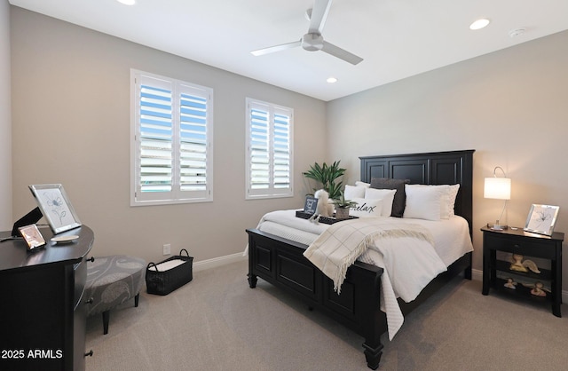 carpeted bedroom with ceiling fan, baseboards, and recessed lighting