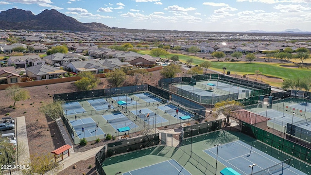 drone / aerial view featuring a mountain view and a residential view