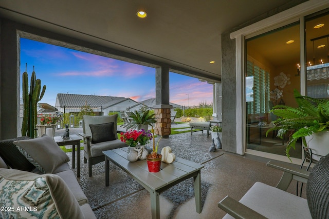 exterior space with an outdoor hangout area and fence