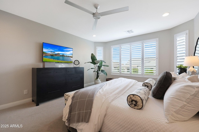 bedroom featuring recessed lighting, light carpet, a ceiling fan, visible vents, and baseboards