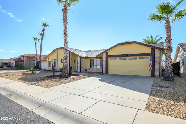 ranch-style home with a garage