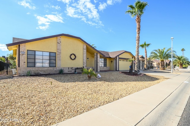 single story home with a garage