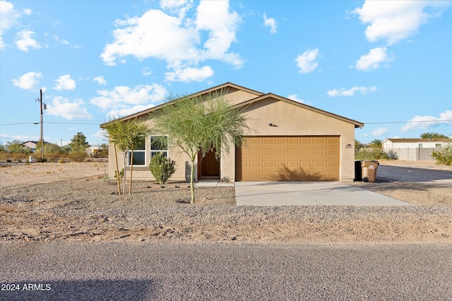 single story home featuring a garage