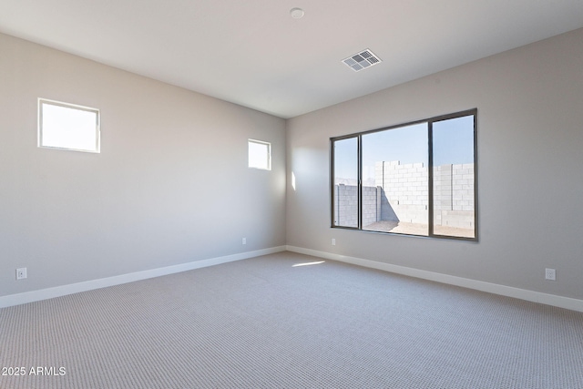 view of carpeted spare room