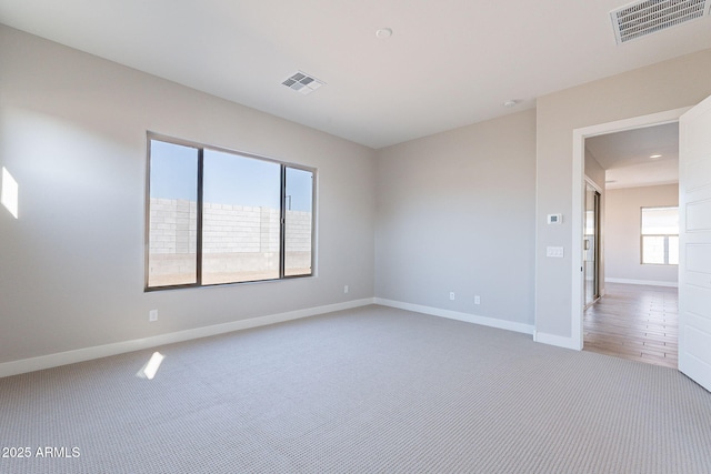 view of carpeted spare room