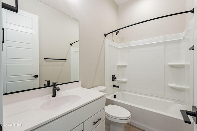 full bathroom with vanity, toilet, and shower / tub combination