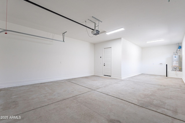 garage featuring gas water heater and a garage door opener