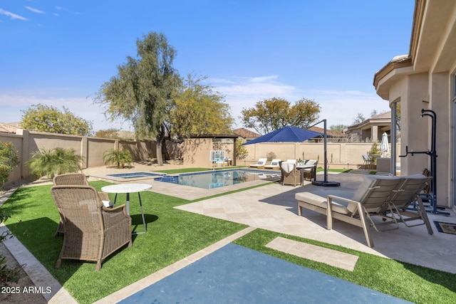 view of pool featuring a fenced backyard, a lawn, a fenced in pool, and a patio