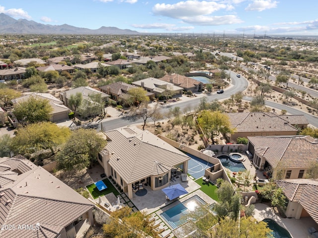 drone / aerial view with a residential view and a mountain view