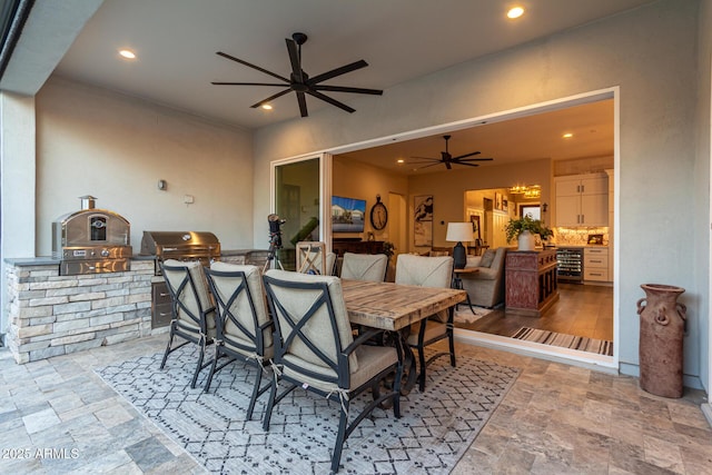 11385 N Luckenbach St, Surprise, AZ 85388 - view of patio featuring an outdoor kitchen, wine cooler, and a ceiling fan