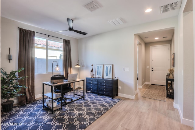 office area with ceiling fan and hardwood / wood-style flooring