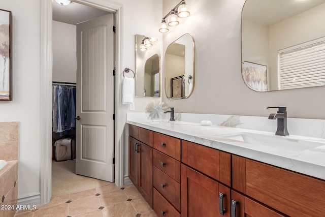 bathroom featuring vanity and tile patterned flooring