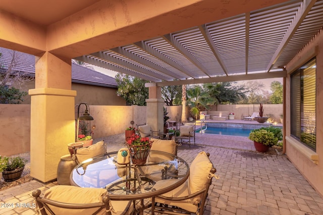 view of patio featuring a pergola and a fenced in pool