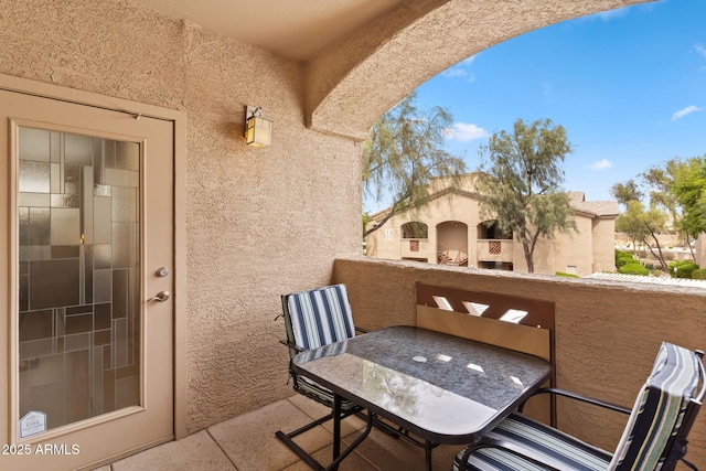 balcony with outdoor dining area