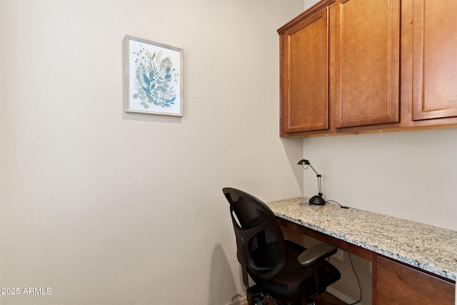 office area featuring built in desk