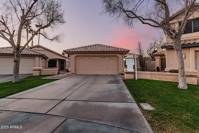 mediterranean / spanish-style home featuring a lawn