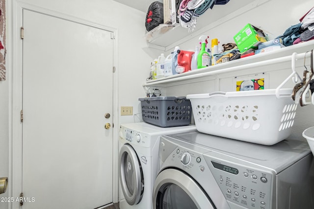 laundry area with washer and clothes dryer