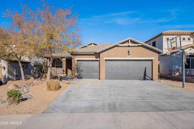 view of front of home featuring a porch and a garage