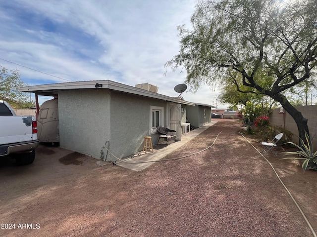 view of home's exterior featuring a patio area