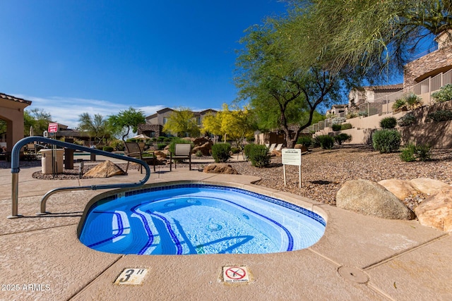 7445 E Eagle Crest Dr Unit 1145, Mesa, AZ 85207 - view of pool with fence and a community hot tub