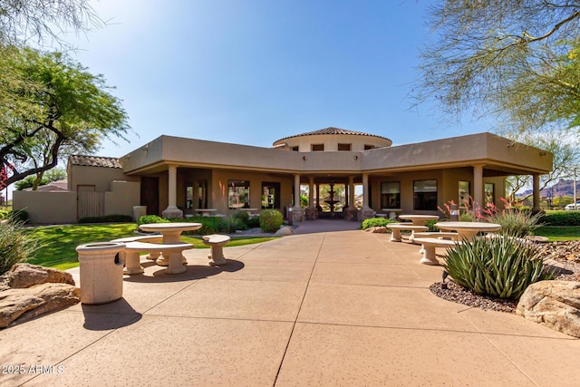 7445 E Eagle Crest Dr Unit 1145, Mesa, AZ 85207 - back of house featuring stucco siding
