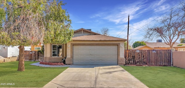 view of front of home featuring a garage and a front lawn