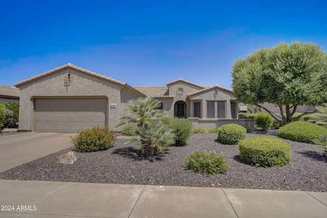 view of front of house with a garage