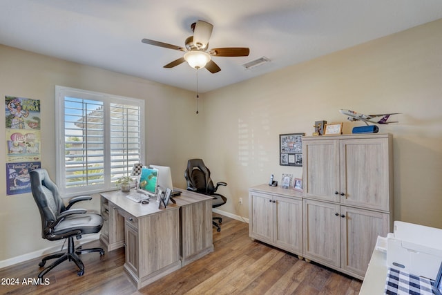 office with ceiling fan and light wood-type flooring