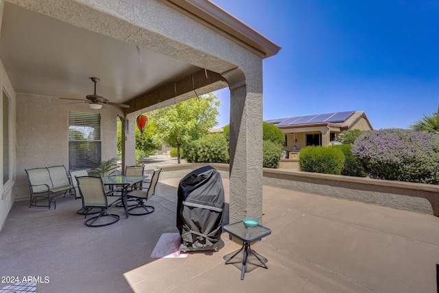 view of patio / terrace with area for grilling and ceiling fan