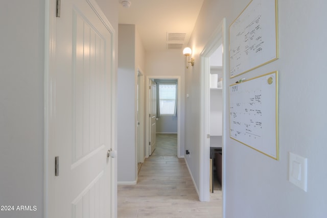 corridor featuring light wood-type flooring