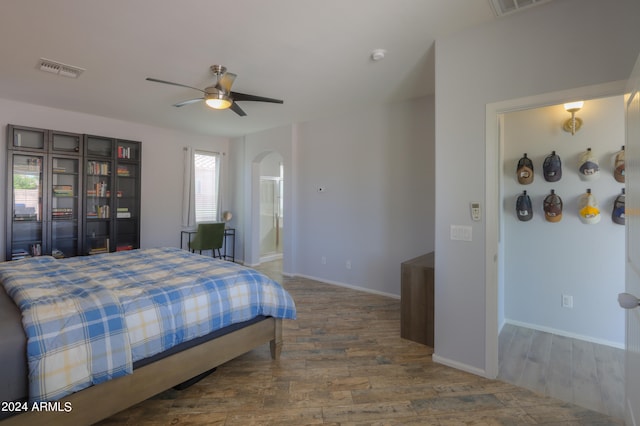 bedroom featuring ceiling fan and hardwood / wood-style floors