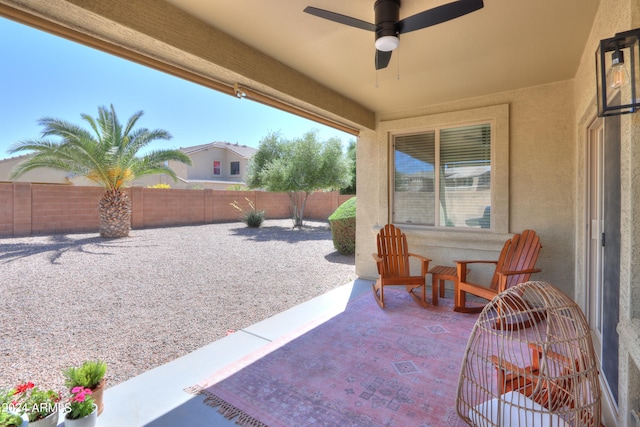 exterior space with a patio and ceiling fan