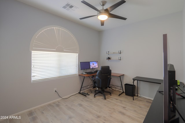 office featuring light hardwood / wood-style flooring and ceiling fan