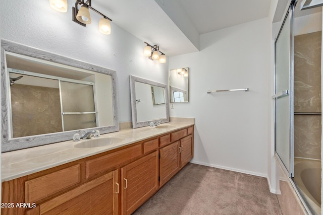 bathroom with vanity and bath / shower combo with glass door