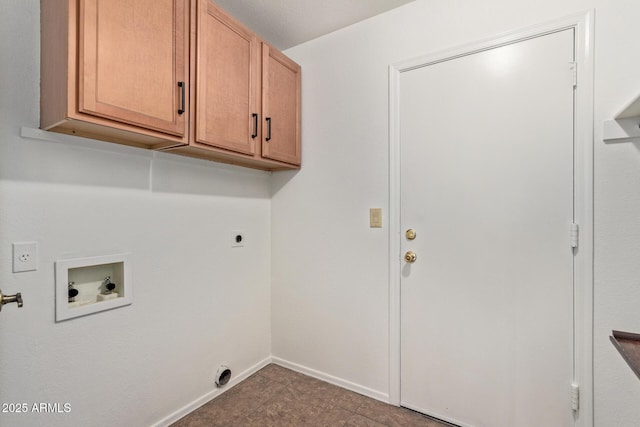 clothes washing area featuring electric dryer hookup, hookup for a washing machine, and cabinets