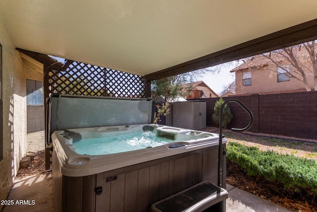 view of patio / terrace featuring a hot tub