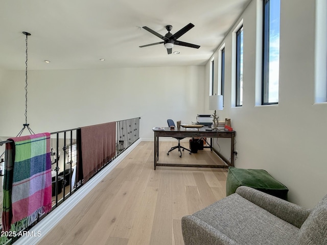 home office featuring recessed lighting, light wood-style floors, baseboards, and ceiling fan