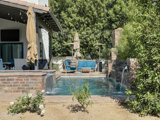 view of swimming pool featuring an outdoor living space, a patio area, and fence