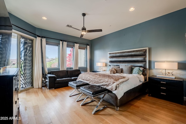 bedroom featuring ceiling fan and light wood-type flooring