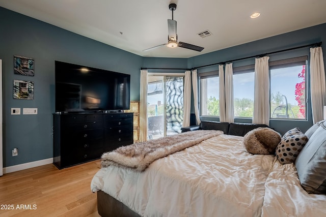 bedroom featuring ceiling fan, access to exterior, and light hardwood / wood-style flooring